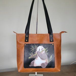 NEW in box, brown and black top grain leather tote with Panda